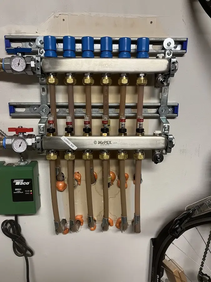 Plumber performing Leak Detection at a residential property in Redmond